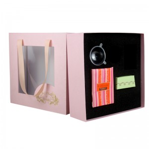 Elegance -laukkulaatikko näyttää täyden sarjan lahja-teeruokaa käsin lahjapakkauksella